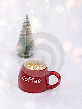 Red ceramic mug with coffee and marshmallows