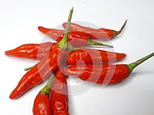 red ceyenne pepper on a white background.red chilli