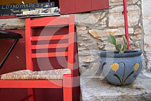 Red chair and green cactus