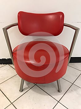 Red Chair Retro Furniture on Square Floor Tiles