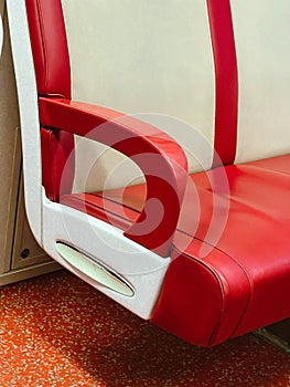 Red chair in a train car