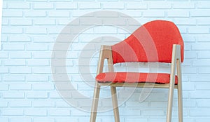 Red chair on white brick background,Modern room,copy space