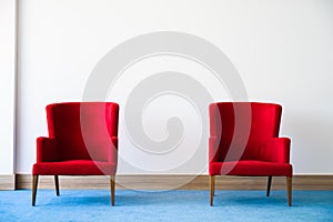 Red chair in white interior