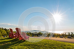 Red chairs from Butland lookoff with a beautiful view of Fundy