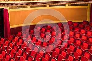 Red chairs in classic theater
