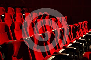 Red chairs on the empty cinema