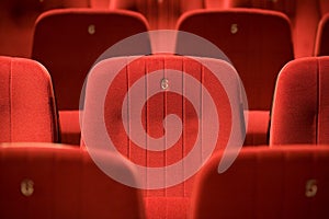 Red chairs on the empty cinema