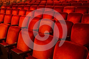 Red Chairs inside a Theatre