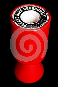 Red charity collection tin