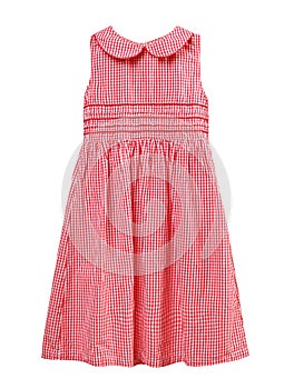 Red checked summer child girl`s dress isolated,nobody