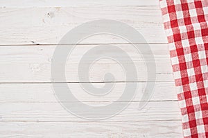 Red checkered tablecloth wooden background texture kitchen decoration