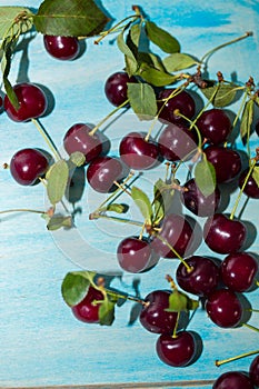 Red cherries on blue background