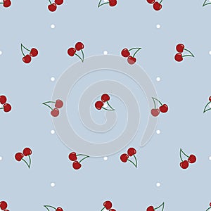 Vector seamless pattern with cherries on blue and white dot background.