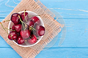 Red cherries in bowl