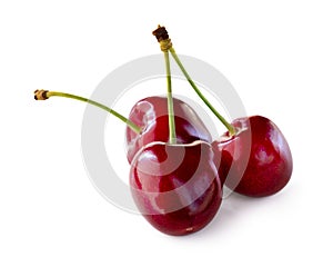 Red cherries isolated on white background