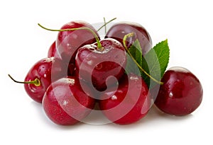 Red Cherries isolated on white.