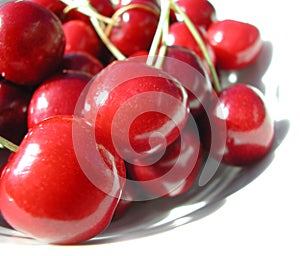 Red cherries on a plate