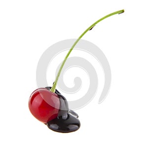 Red cherry in chocolate isolated on white background