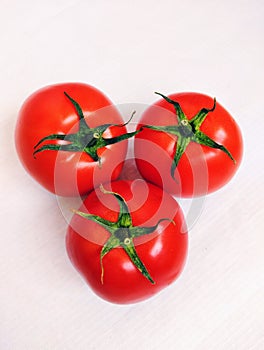 Red cherry tomatoes fruit vine tomato vegetable 
tamaatar tomat timatar pomidor tomate closeup view image photo