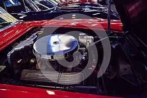 Red 1962 Chevrolet corvette convertible displayed at the Muscle Car City museum