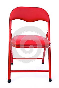 Red child's chair on white