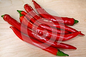 Red chili pepper on the board