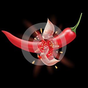 Red chili peppers and garlic splashing isolated on black background.