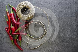 Red chili peppers on kitchen table