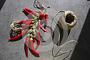 Red chili peppers on kitchen table