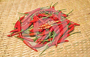 Red Chili Peppers With Seeds on bamboo mat