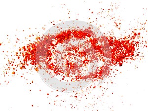 Background with red cayenne pepper dry powder isolated on white background. photo