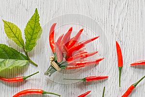 Red chili vegetable on rustic wood background.chili pepper