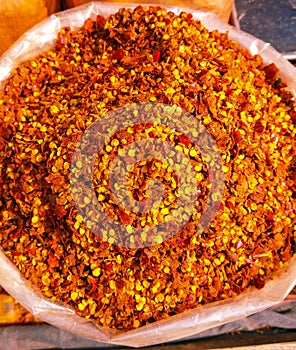 Red chilli flakes dried crushed red chillies, hot spice flocons de piment, hojuelas dechile, flocos de pimenta photo