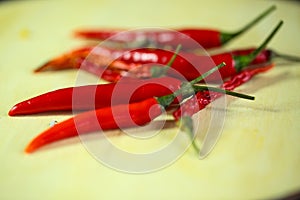 red chilli pepper on wooden ground, decoration