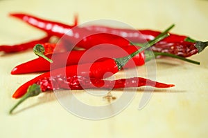red chilli pepper on wooden ground, decoration