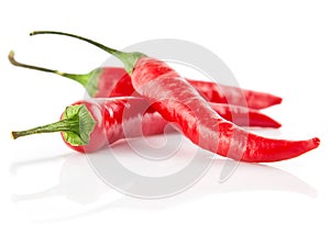 Red chilli peppers isolated on white