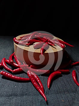 Red chilli seeds placed on a cutting board