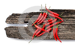 Red chillies on a plank
