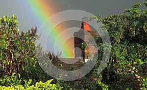 Red chimney with rainbow.