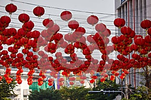 Red chinese lanterns hanging on the street