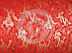 Red chinese silk with golden dragons and flowers