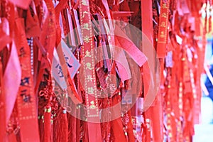 Red Chinese Wishing ribbons hanged up
