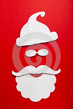 Red christmas background, paper Santa Claus concept. Xmas celebration and decoration, design of greeting postcard, modern banner
