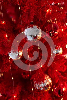 Red Christmas background with red and silver bouble ornaments