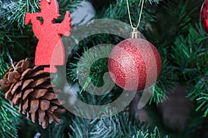 Red christmas ball on the christmas tree.