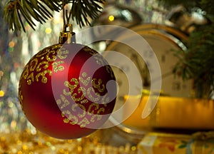 Red Christmas ball on fir tree