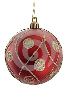A red christmas ball with golden ornaments
