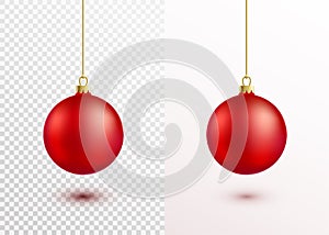 Red christmas ball hanging on gold string isolated on white background