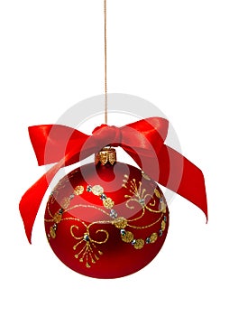 Red christmas ball with ribbon isolated on a white