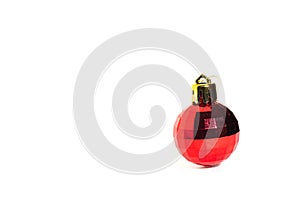 Red christmas ball, white background